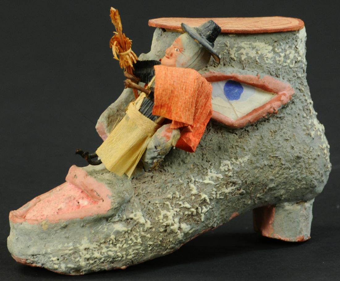 COMPOSITION WITCH ON LIVING BOOT CANDY CONTAINER (1 of 4)