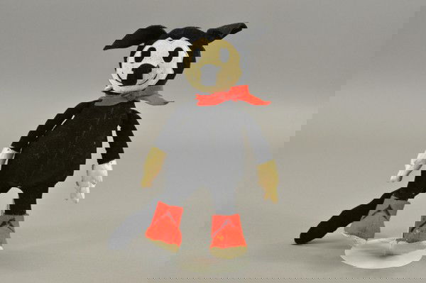 KRAZY KAT DOLL: Beautiful doll made from velvet and felt, depicts the comic cat known as Krazy Kat, a creation of comic strip artist George Herriman, circa 1920's. 12" h.