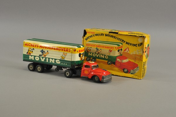MICKEY MOUSE MOVERS TRUCK WITH ORIGINAL BOX: Japan, Linemar, copyright Walt Disney Productions, friction powered, features red tractor pulling lithographed tin moving van with colorful images of the Mouseketeers on sides, rear doors open, wear t