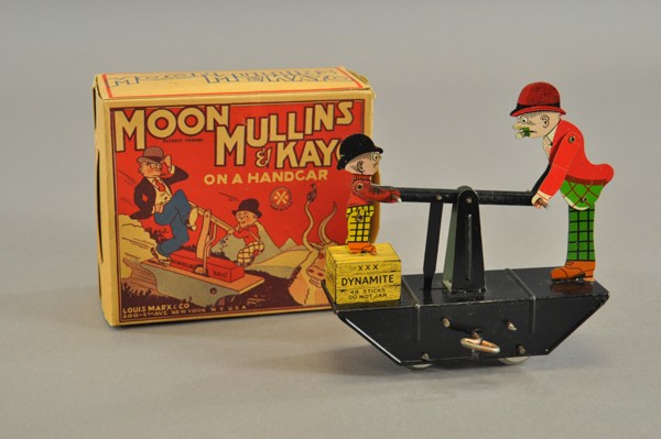 MOON MULLINS + KAYO HANDCAR WITH BOX: Louis Marx, lithographed tin, depicts popular duo on hand car with key wind that allows for the traditional up & down movement that makes a handcar move forward. 6" l.