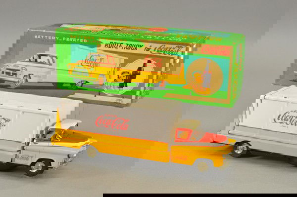 COCA-COLA ROUTE TRUCK WITH BOX: Sanyo, Japan, battery-operated, lithographed tin, long enclosed carrier van and cab, Coca-Cola logo on front and sides, very colorful. 13" l.