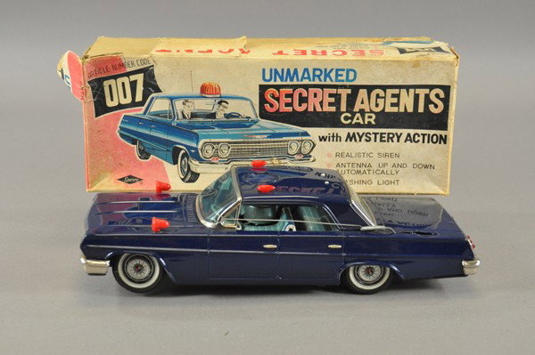 CHEVROLET "SECRET AGENTS" CAR: Spesko, Japan lithographed tin, done in blue body, red plastic lights, nickel trim, tall antenna, features multi battery operated actions, interesting 007 article numer on box, some corrosion at batte