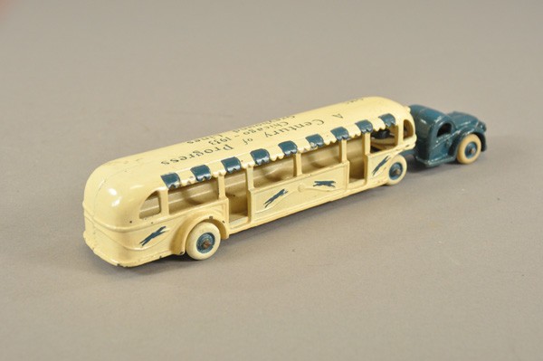 ARCADE GREYHOUND BUS: Mid 1930's, cast iron, done in familiar blue and white, roof stenciled, "Century of Progress Chicago - 1933," blue painted embossed Greyhound on sides. 11 1/2" l.