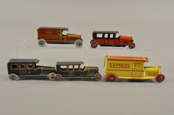 GROUP OF FIVE AUTO PENNY TOYS: Germany, lithographed tin, consists of three Fisher pieces: a yellow "Express" van, a red panel van #298, and a blue limousine; also includes two Kellermann limousines, one teal with yellow highlights