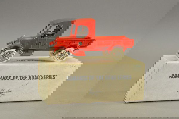 MOTORCADE TOYS PICK-UP TRUCK: Larry Seiber contemporary, cast iron, painted in red, rubber tires, box reads, "Speedy Pickup." 8 1/2" l.