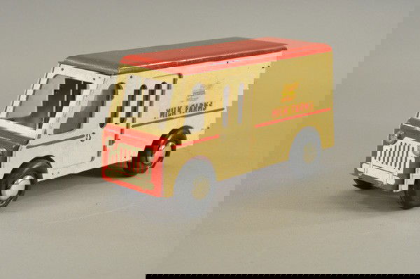 BUDDY "L" WOOD MILK TRUCK: c. 1948, delivery van painted in white body, red roof and flooring, features sliding side doors, milk carton with two original bottles. 12 1/2" l .