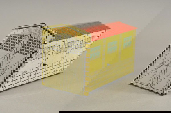 GUNTHERMANN FIRE HOUSE: Germany, c.1930, lithographed tin, opening front doors, well detailed graphics on all sides depicting early brick fire station. 8" h. x 11 1/2" l.