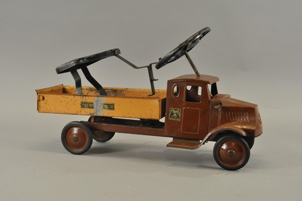 STEELCRAFT MACK "PLAYBOY TRUCKING CO." RIDE-ON: c. 1930's, pressed steel, enclosed Mack cab with electric lights, tan dump body contains child seating interior, disc wheels, thin rubber tires. 25" l.