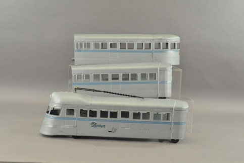 BUDDY "L" ZEPHYR (THREE UNITS) WITH BOX: c. 1935, pressed steel, painted in a flat matte silver, decal appears on engine car, features pull handle, rubber tires for easy pulling, quite scarce example. Provenance: Keats Collection. 65" l.
