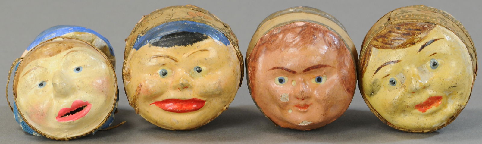 LOT OF FOUR MOON FACE SQUEAK TOYS (1 of 3)