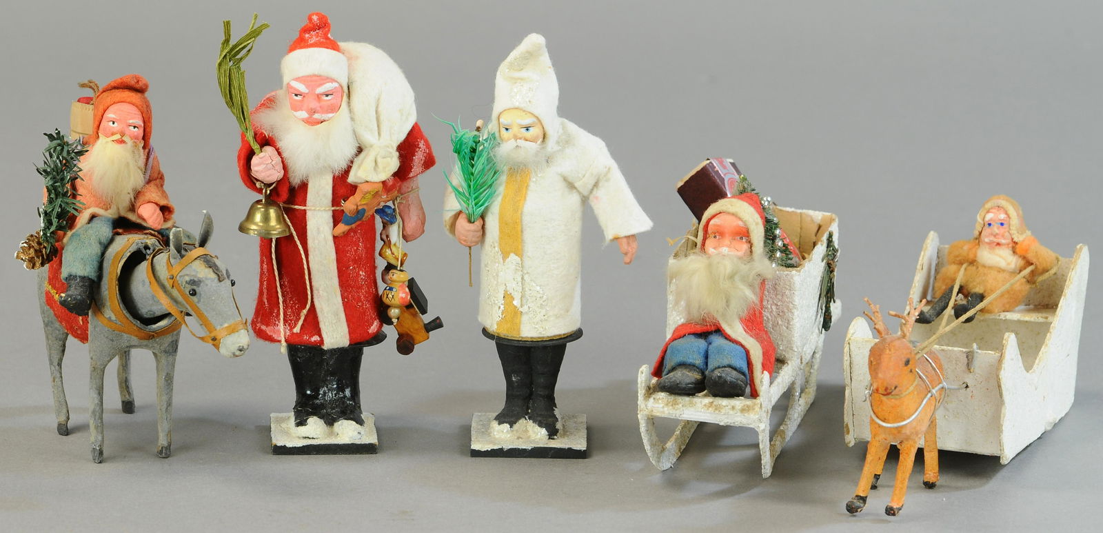 FIVE SANTA FIGURES (1 of 3)
