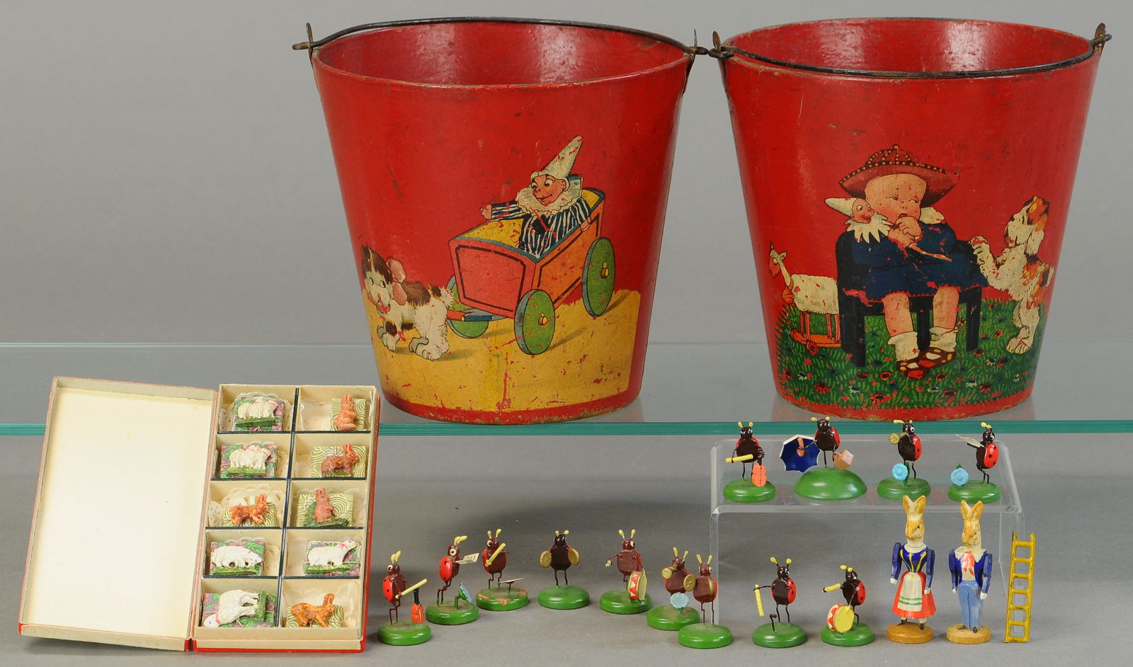 TWO SAND PAILS AND A GROUPING OF FIGURES (1 of 4)
