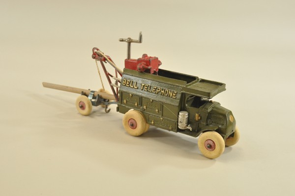BELL TELEPHONE TRUCK: Hubley, cast iron, painted green, Mack "C" cab w/roof overhang and open top body includes winch & tools, rubber tires. 9 1/4" l.