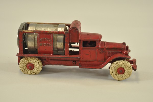 JAEGER CEMENT MIXER: Kenton, red version, cast iron, features nickel rotary cement mixer on body, embossed open frame, white rubber tires. 9" l.