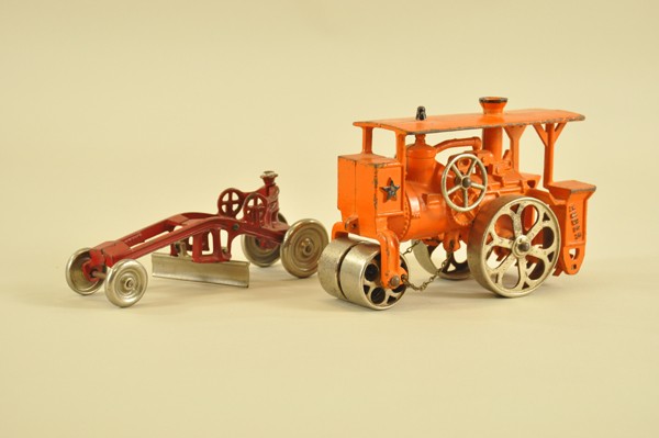 HUBER ROAD ROLLER AND ROAD SCRAPER: Both cast iron, Huber painted in orange, nickel spoke wheels, scraper done in red, nickel scraper and disc wheels, made by Kenton. 7 1/2" l.