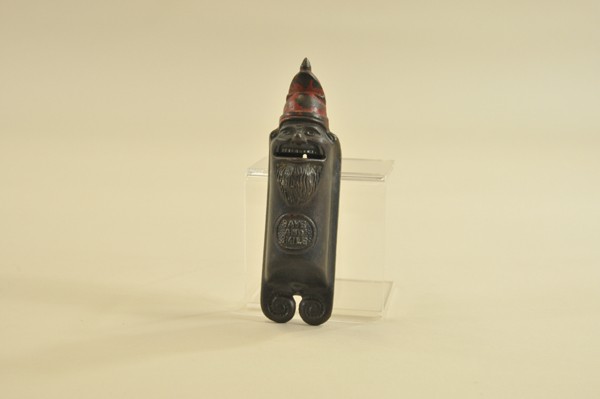 SANTA "SAVE & SMILE" HANGING STILL BANK: England, rare example, cast iron, painted in black w/red hat, embossed "Save & Smile" on front, hangs on wall. 7 1/4" h.
