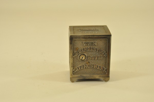 J.B. BARNABY & CO. BOYS SAVINGS STILL BANK: Rare example, nickel finish, heavily embossed advertising still bank, key lock door, ISB #62. 4 1/2" h.