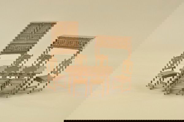 ARCADE DINING ROOM SET: Cast iron, painted in light brown overall, a rare color for this set, includes: china cabinet, sideboard, table and six chairs, gold highlights on all pieces.