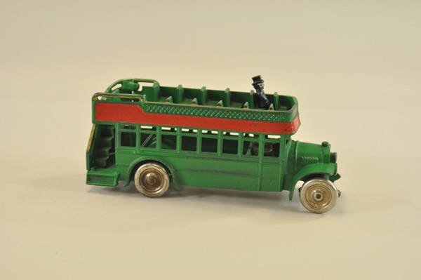 CITY BUS: Kenton, cast iron, painted green w/red trim, double decker bus w/open roof seating, rubber tires. 9 3/4" l.