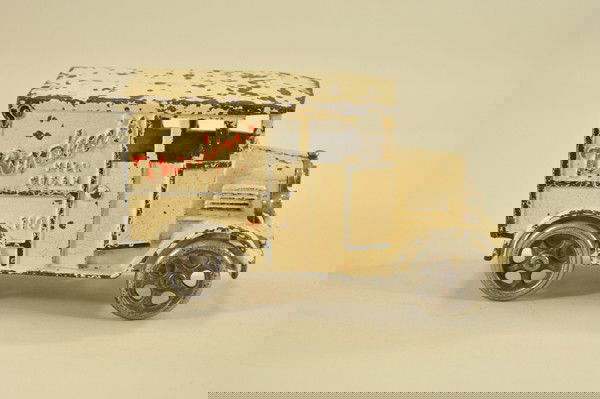 BORDEN'S MILK TRUCK: Hubley, scarce example, cast iron, painted white overall w/embossed lettering on side panel, large truck has opening door in rear, nickeled grille, headlights & spoke wheels. 7 1/2" l.