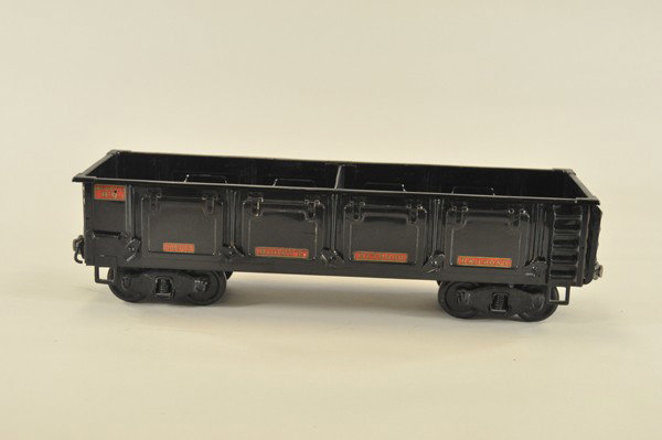BUDDY "L" BALLAST CAR: Late 1920's, pressed steel, painted in black overall, interior features "V" bottom for unloading, four top hinged opening, release load doors, each with decal, non-removable divider at center body. 22