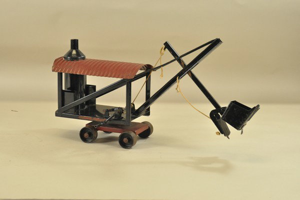 BUDDY "L" STEAM SHOVEL: Pressed steel, black open frame, lever controlled shovel arm, red roof and vertical boiler. 24" extended.