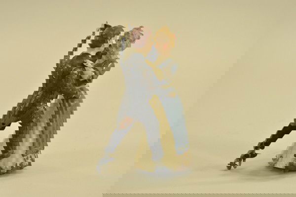 TANGO DANCERS: Gunthermann, Germany, hand painted tin, great toy depiction of couple able to dance about, arm in arm as clockwork is activated. 8" t.