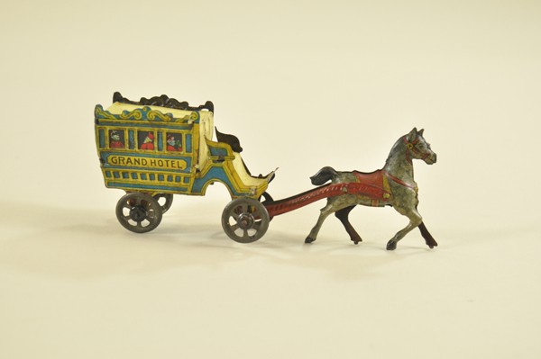 MEIER OMNIBUS PENNY TOY: Horse drawn version, colorful lithography throughout, fancy die-cut trim at roof top and seat ends. 5 3/4" l.