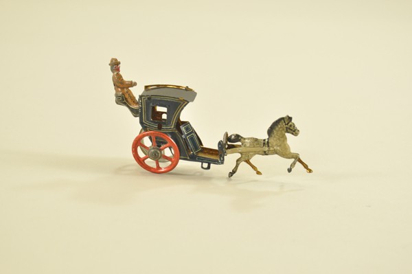HANSOM CAB PENNY TOY: Solo horse pulls dark blue and black cab, red spoke wheels, driver in tan uniform, gold interior. 4 1/4" l.