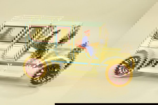 CONTEMPORARY LIMOUSINE: Modeled after Carette 1911 example, hand painted tin limo done in white overall w/ aqua blue roof & blue trim throughout, features four nickel plated lights, opening rear doors, wire roof rack, bevele