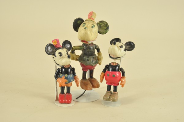 MICKEY AND MINNIE MOUSE CELLULOID FIGURES: Japan, Disney characters are hand painted, flexible arms and heads, smaller pair still retain paper label, all have loose stringing. 4"-5" t.