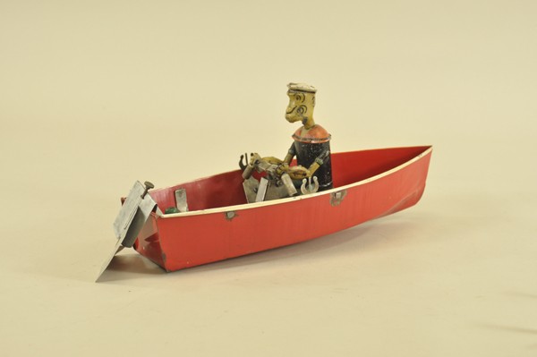POPEYE IN ROWBOAT: Hoge Mfg., popular example, pressed steel rowboat painted in red, features Popeye at the oars on open bench seat, clockwork mechanism. 14" l.