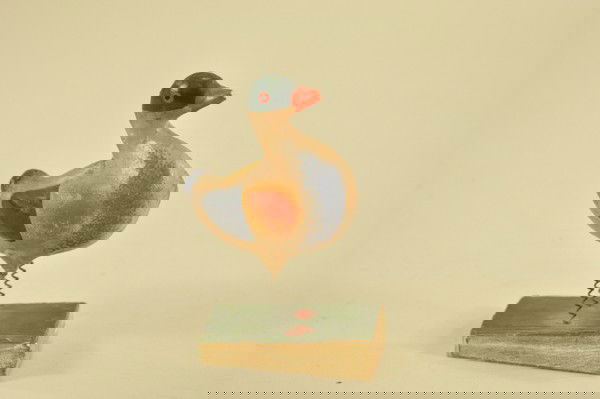 SMALL MALLARD DUCK SQUEAK TOY: Hand painted, papier mâché body with spring legs, wood base acts as bellows. 3 1/4" x 5 1/4" t.