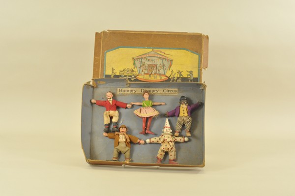 BOXED SCHOENHUT REDUCED SIZE CIRCUS FIGURES: Original labels on box, No. 21/46 five piece assorted set for Humpty Dumpty Circus includes: ring leader, lady rider, dude, hobo and clown; all hand painted, wood jointed, composition head figures, al