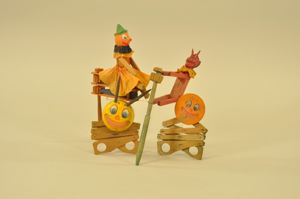 GERMAN NOISE MAKERS & FINGER PUPPETS: Includes two scissor toys with jack-o-lantern heads, one with spring horns, along with two ratchet style noisemakers, one pumpkin girl with crepe paper skirt and one devil boy, both with composition h