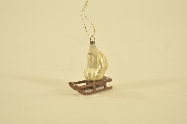 BLOWN GLASS SANTA ON DRESDEN SLEIGH: German glass Christmas tree ornament, Santa with crushed glass cap on a Dresden sled. 2 3/4" t.