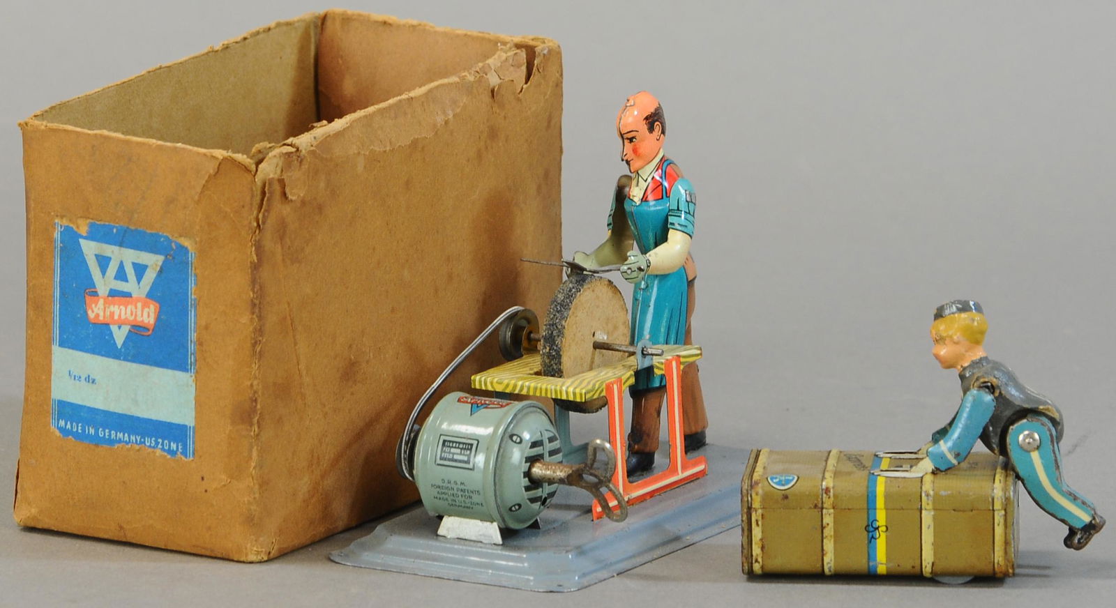 ARNOLD SCISSOR GRINDER 2/ GESCHA PORTER TOY (1 of 2)