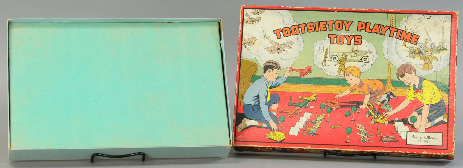 TOOTSIETOY AERIAL OFFENSE SET #5051: 419. TOOTSIETOY AERIAL OFFENSE SET #5051 | Box, 10" x 15" | All Original Condition. | $250 - $500