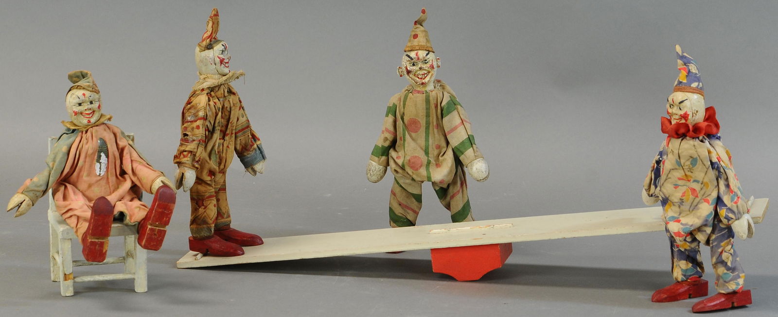 FOUR SCHOENHUT CLOWNS W/ CIRCUS PROPS (1 of 3)