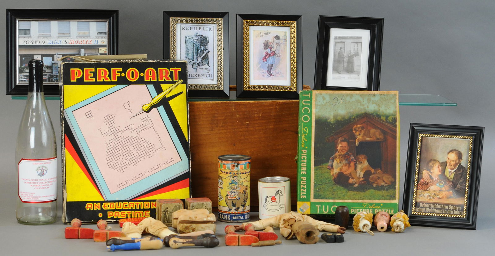 BOX LOT W/ BOTTLE, FRAMED PHOTOS, SCHOENHUT PARTS (1 of 2)