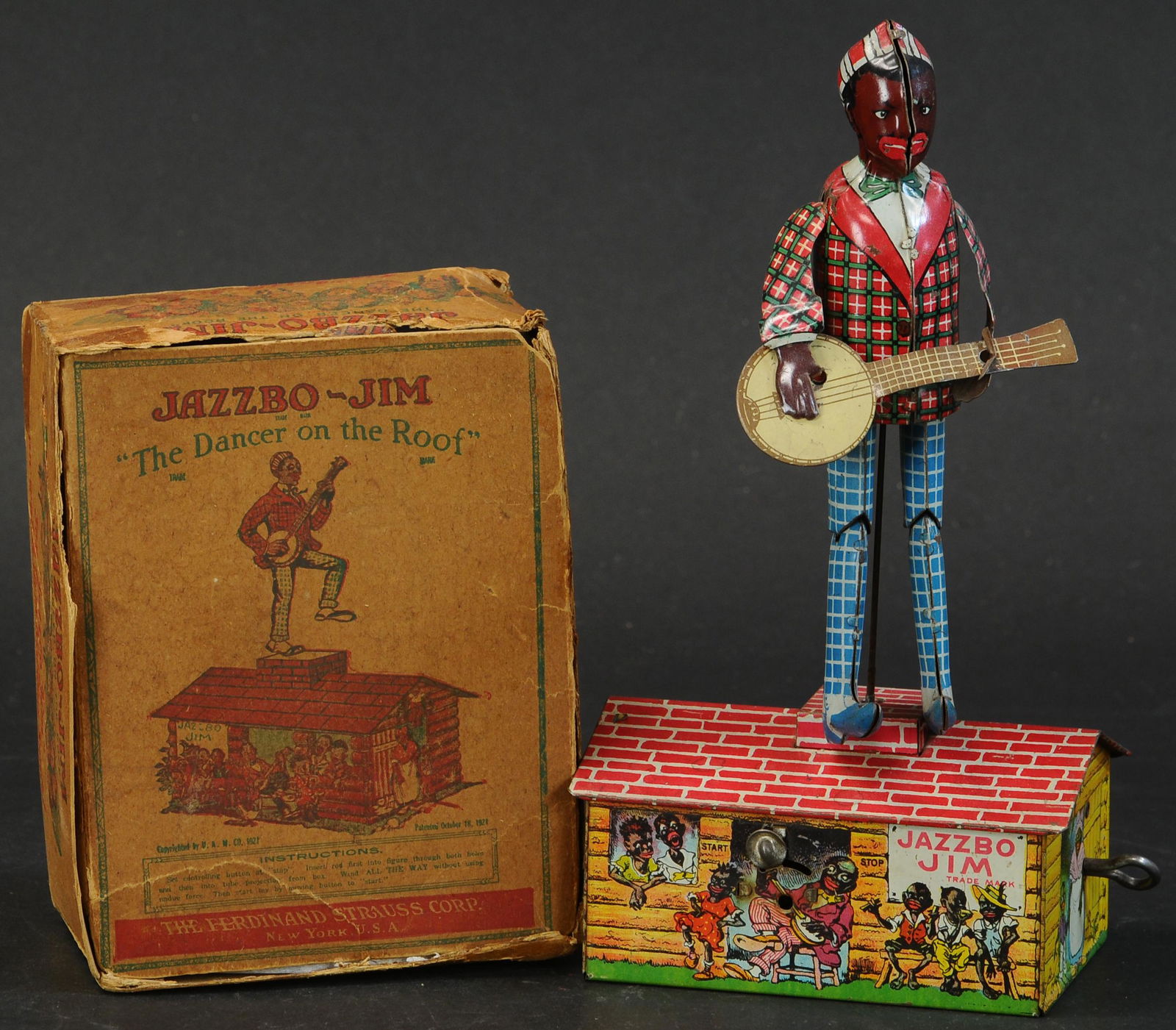 484. BOXED UNIQUE ART JAZZBO JIM | Wind-up. Provenance: (1 of 3)