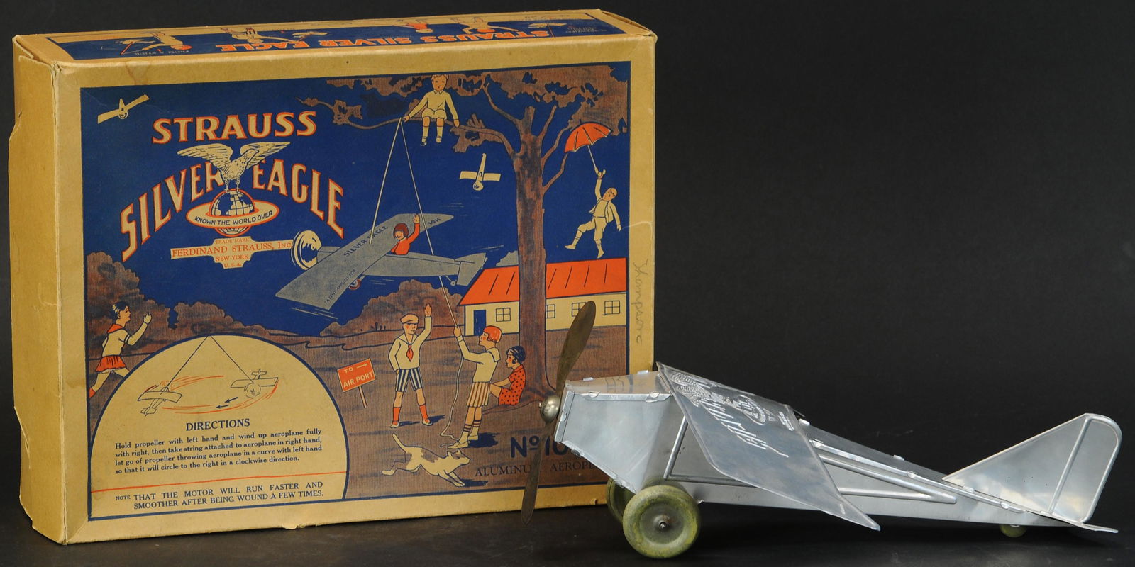 528. BOXED STRAUSS SILVER EAGLE AIRPLANE | Wind-up. | (1 of 3)