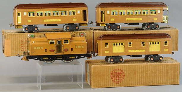 LIONEL #318E PASSENGER SET: 4. LIONEL #318E PASSENGER SET | Standard Gauge. | Provenance: Paul Cole Collection. | Loco 11.5" l. | Loco wheels replaced, chips filled in on coach roof, otherwise in (Exc. Cond.) | $400 - $800