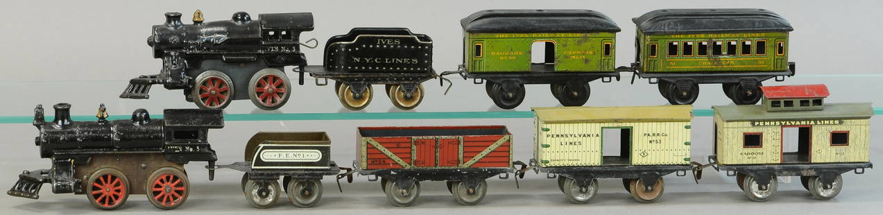 IVES FREIGHT AND PASSENGER SETS: 11. IVES FREIGHT AND PASSENGER SETS | 0 Gauge. | Provenance: Paul Cole Collection. | Loco 6.5" l. | Freight set in (Exc. Cond.), passenger set in (Good - VG Cond.) | $150 - $300