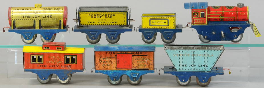 COLORFUL JOY LINE FREIGHT SET: 16. COLORFUL JOY LINE FREIGHT SET | 0 Gauge. | Provenance: Paul Cole Collection. | Loco 6" l. | (Exc. Cond.) | $300 - $600