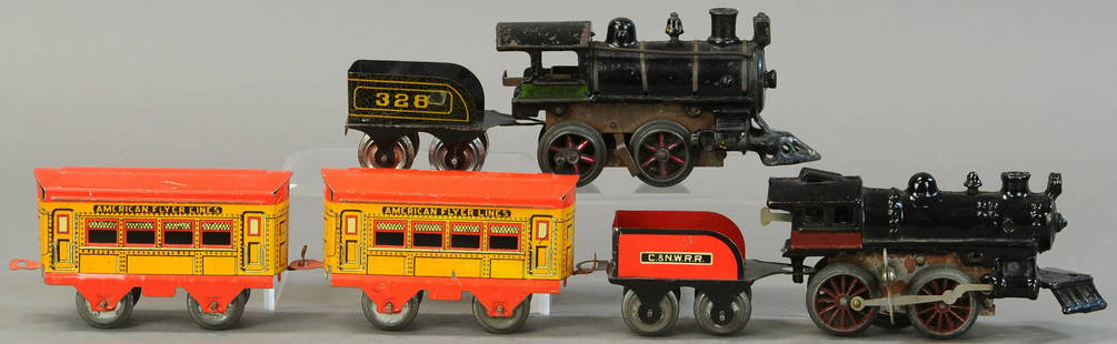 METZEL LOCO AND FLYER SET WITH C&NWRR TENDER: 21. METZEL LOCO AND FLYER SET WITH C&NWRR TENDER | 0 Gauge. | Provenance: Paul Cole Collection. | Loco 6.5" l. | #328 tender missing coupler, Mutzel loco missing tender coupler pin and side rods, over