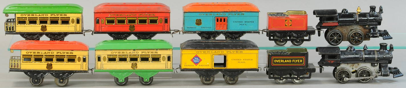 COLORFUL HAFNER OVERLAND FLYER SETS: 22. COLORFUL HAFNER OVERLAND FLYER SETS | 0 Gauge. | Provenance: Paul Cole Collection. | Loco 7.5" l. | One green roof and one red roof repainted, in (Exc. Cond.) | $200 - $400