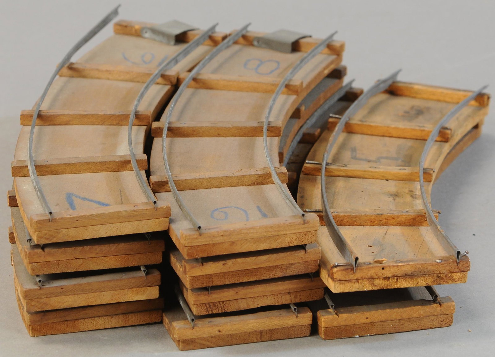 WEEDEN LIVE STEAM TRACK: 32. WEEDEN LIVE STEAM TRACK | Standard gauge width | Provenance: Paul Cole Collection. | 14" l. | One rail missing, writing on each track, overall in (Exc. Cond.) | $100 - $300