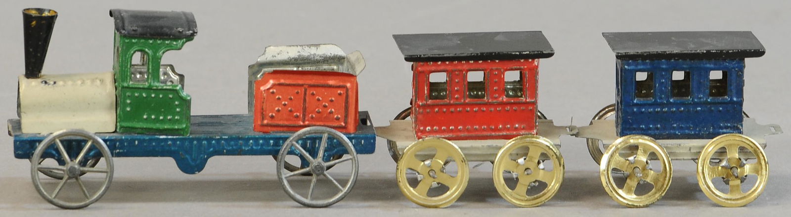 EARLY MEIER TRAIN SET PENNY TOY: 195. EARLY MEIER TRAIN SET PENNY TOY | Germany. | Provenance: Paul Cole Collection. | Loco 3.75" l. | (Exc. - Pristine Cond.) | $300 - $600