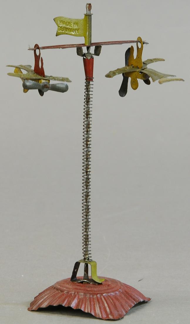 TALL EINFALT SPIRAL PLANE PENNY TOY (1 of 2)